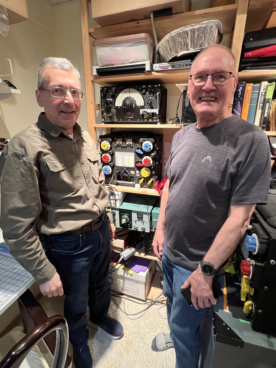 Jerry Spring VE6TL (L in first photo) and Ken Hill VE6AGD examine Jerry’s working vintage World War 2 Transmit and Receive radios for a Lancaster bomber, such as at the Bomber Command Museum in Nanton, Alberta