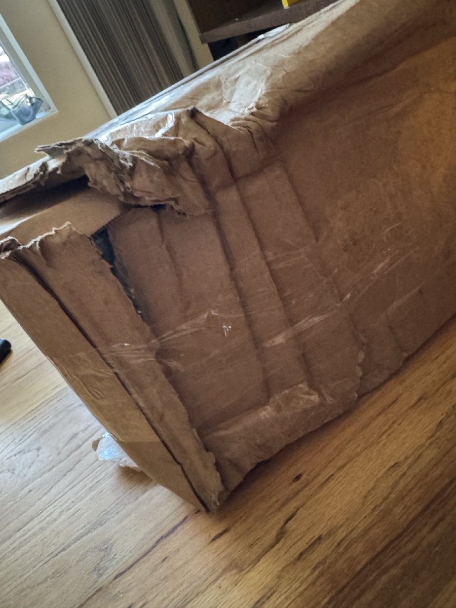 singersteve's tweet photo. My god @UPS did your driver literally KICK this out of the truck and down the street and into my yard? The delivery photo is about 50px x 50px and so blurry it barely even looks like a box. This driver needs to be fired. https://t.co/UFL5NdrZvn