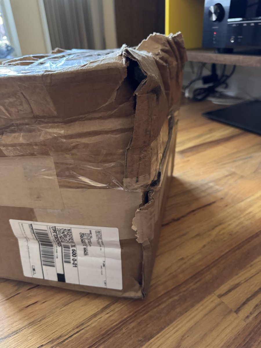 singersteve's tweet photo. My god @UPS did your driver literally KICK this out of the truck and down the street and into my yard? The delivery photo is about 50px x 50px and so blurry it barely even looks like a box. This driver needs to be fired. https://t.co/UFL5NdrZvn