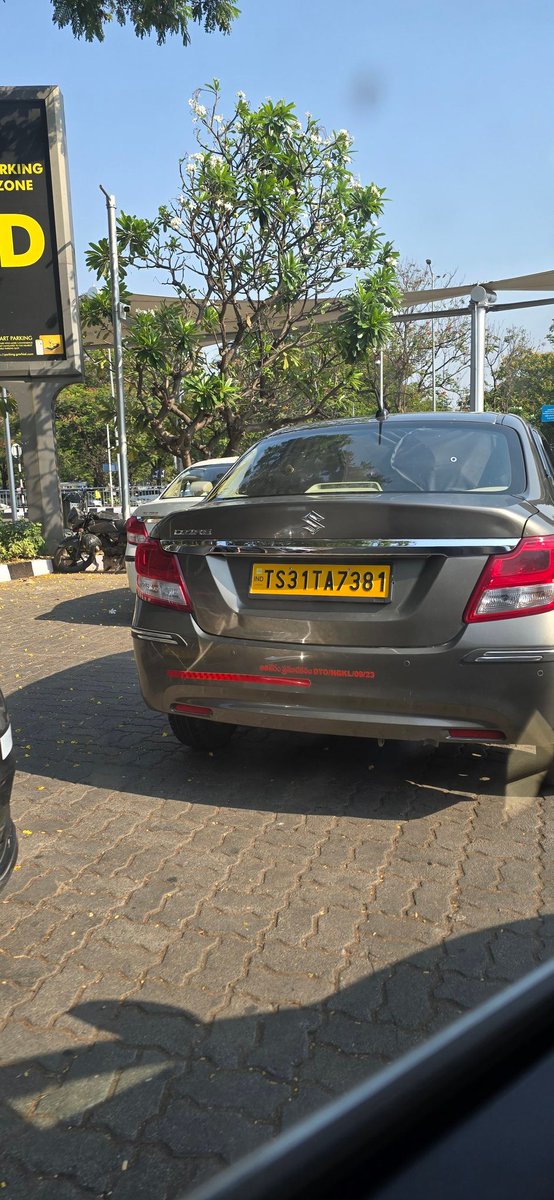 author_nalin's tweet photo. The Uber counter person at hyderabad airport offers cheaper fares if we take a cab thru him versus Uber. The photo is of a cab in the Premier lane that refuses to take a ride. What is happening? https://t.co/SQEnhD1n2f