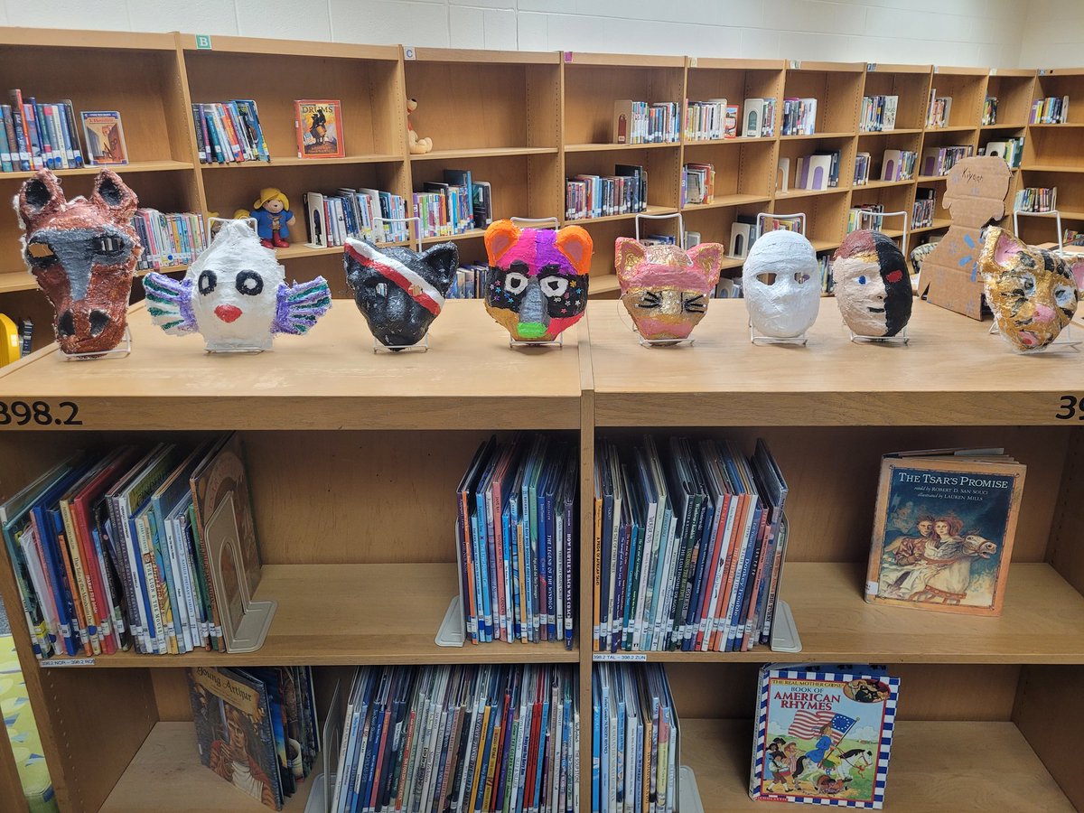 5th grade plaster masks from Ms. Bracke's class on display in the Library <a href="/MorrisvilleElem/">Morrisville Mustangs</a>