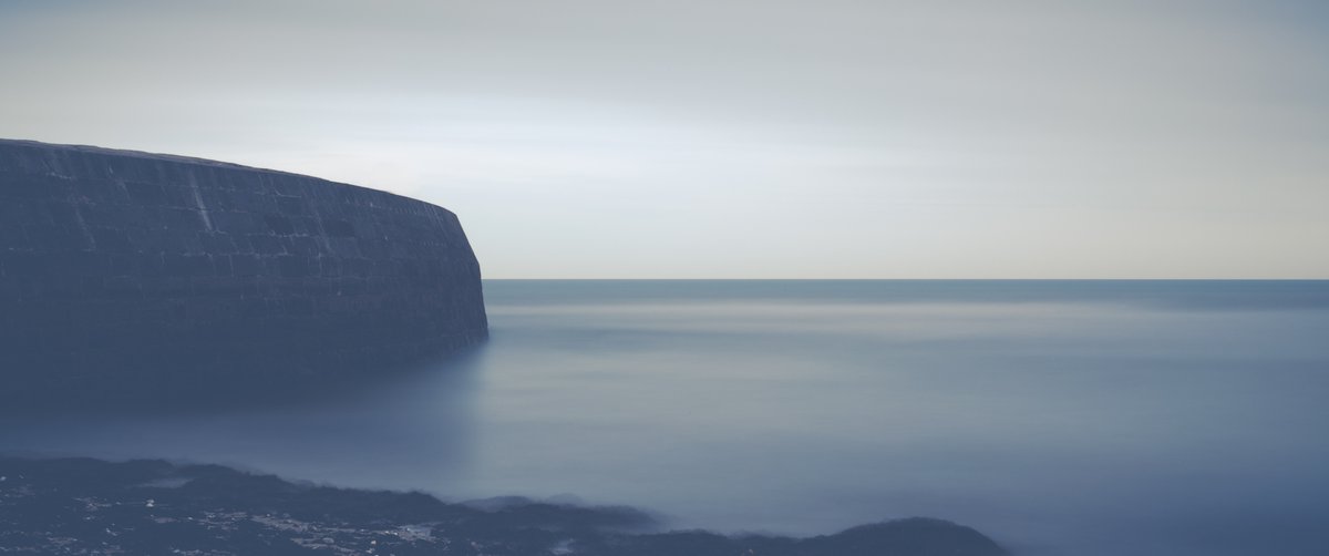 A moment of tranquility captured at this Dorset pier with a long-exposure shot. The waves blur into a silky mist, stretching out endlessly beneath the pier, as the horizon fades into a soft, dreamy glow. So peaceful, yet full of stories.  Have you walked a pier like this in