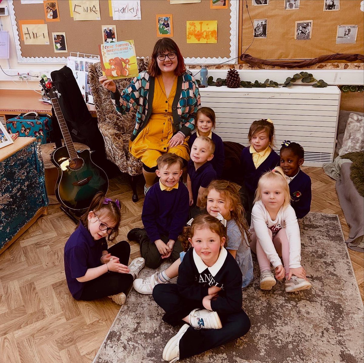 auntyemily's tweet photo. I’m wearing a book cardigan!📚 

Lovely visit to @HareleeshillPS nursery with Crime Squirrel investigators. 

Wonderful singing and dancing to the nuts song! We made the smell of the forest 🪭, solved the mystery and the water swirling was a hit, along with the giant pinecone! https://t.co/APvHpg0q0z