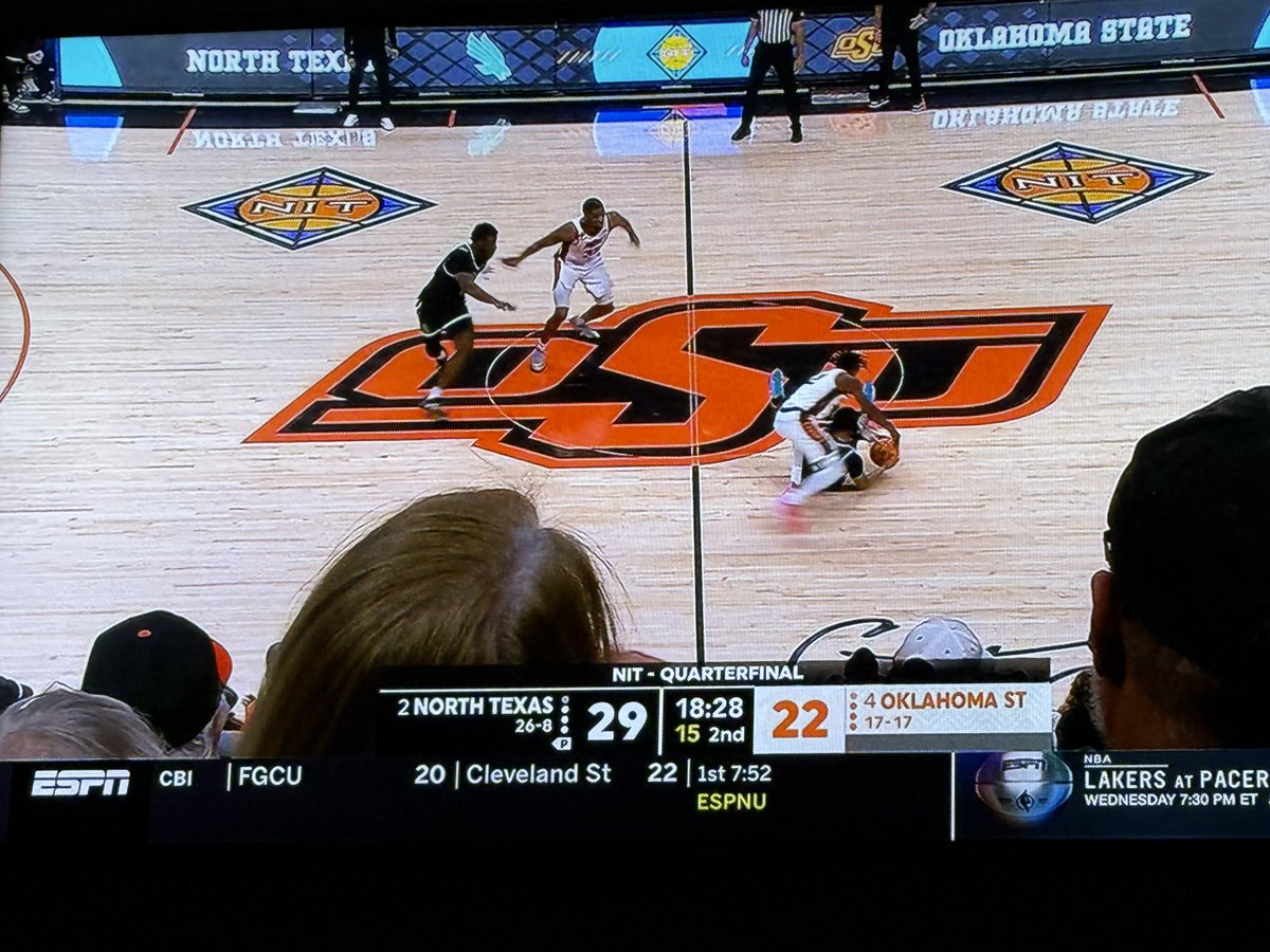 dave_brill's tweet photo. What is up with the camera view of this NIT game. Did they just drop the camera in the middle of the fans?  

I feel bad for the guy with the bald spot. 

#NIT #ncaa @espn https://t.co/7y4SvduoNW