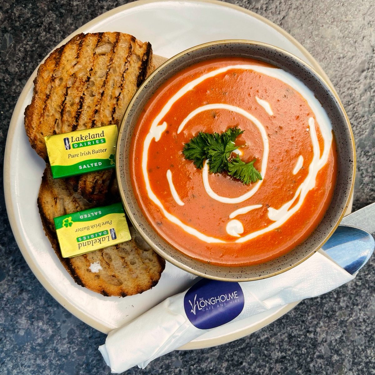 Fresh soup, available daily on our winter menu from 9am - 3pm. On Wednesday's you can get any soup with bread, any tea and any tray bake for £11 until March 28th as part of our ongoing midweek winter promotions. Featured here we see a guest flavour, cream of tomato.