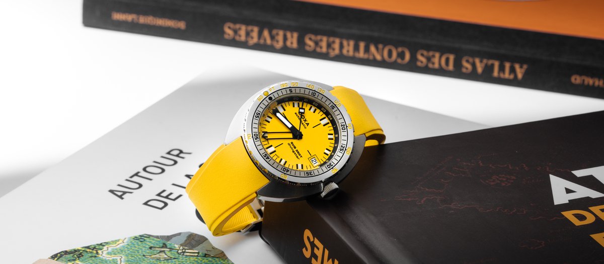 RELEASED TODAY

The Doxa SUB 250T GMT unites the brand’s underwater capabilities with the capacity to see the local time and home time simultaneously. Meehna Goldsmith provides an insightful glimpse into the world of DOXA. #Doxawatches #YourCallToAdventure
escapementmagazine.com/articles/doxa-…