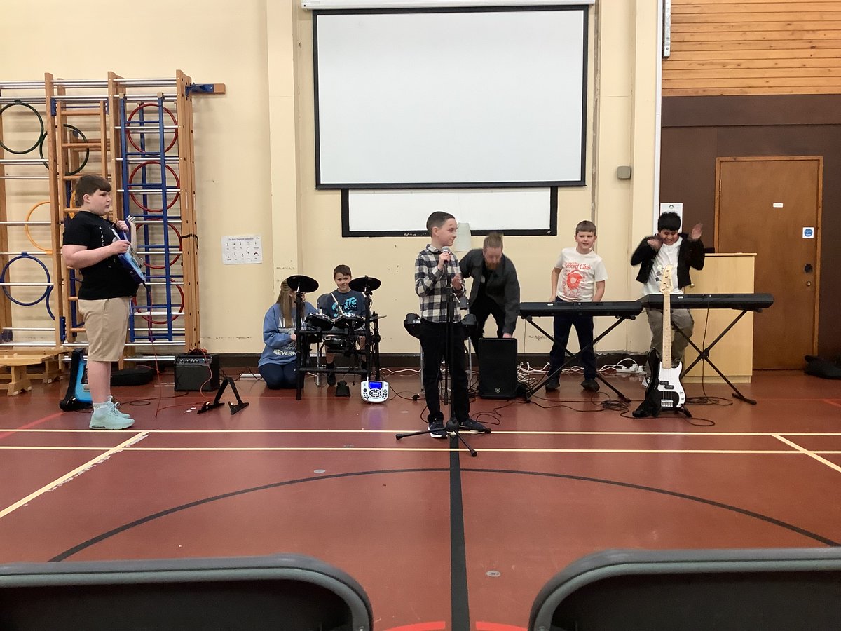 ShawcloughCP's tweet photo. Our budding Rock bands led by band master Adam, in their end of term Rock concert. 🤟 https://t.co/EjCSJZ3KLl