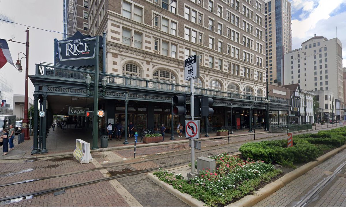 Fantastic historical photo of a scene in front of the Rice Hotel in Houston circa 1917-18.  Obviously, they're trying to get folks to sign up for World War I. The second photo shows the building in a recent street view. It's on the corner of Main Street and Texas Avenue, which is