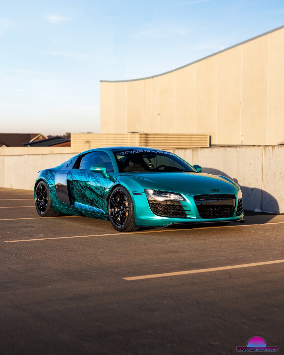 WrapEffectsKC's tweet photo. This stunning R8 just got finished up with a FULL color change and custom design! A combo of @teckwrap Emerald Green and an over laminate with a design! 
———
🏎: Audi R8
Wrap: @teckwrap Emerald Green &amp; Custom Printed Design
——— https://t.co/d0nSUbsUU9