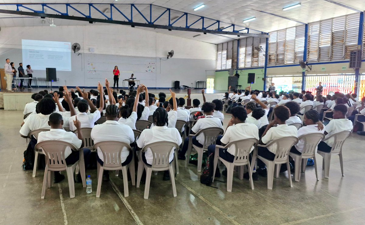 TTJudiciary's tweet photo. The staff of the Judiciary of T&T engaged with students at Marabella North Secondary School's Career Day on March 11, 2025. Students learned about the Judiciary's functions and explored potential career opportunities! 🙌💼 #TTJudiciary https://t.co/XzSB29kQCT