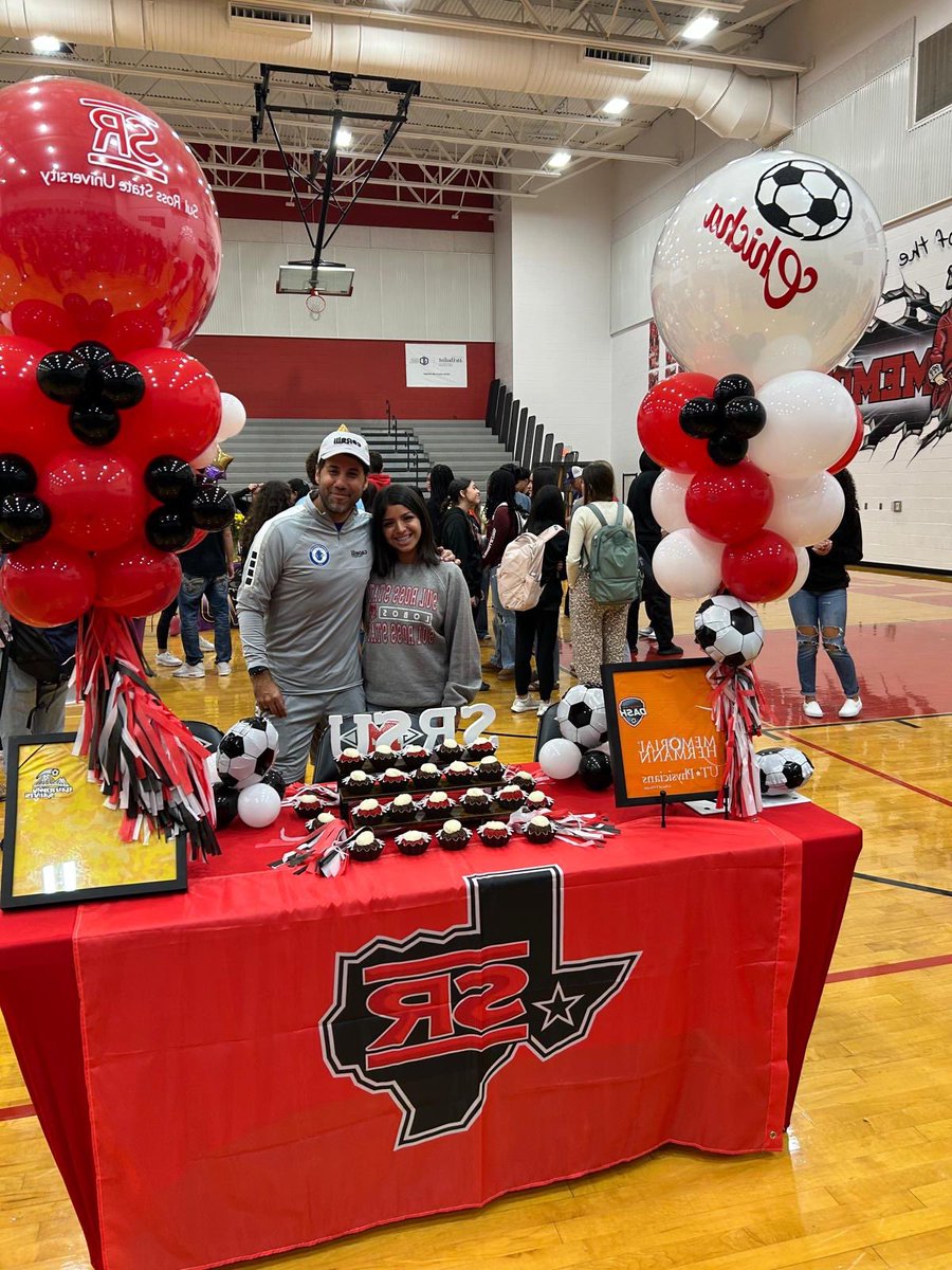 Coach Mikey with Patrica Torres from AHFC 07G Blue E congratulating her on her commitment to Sul Ross