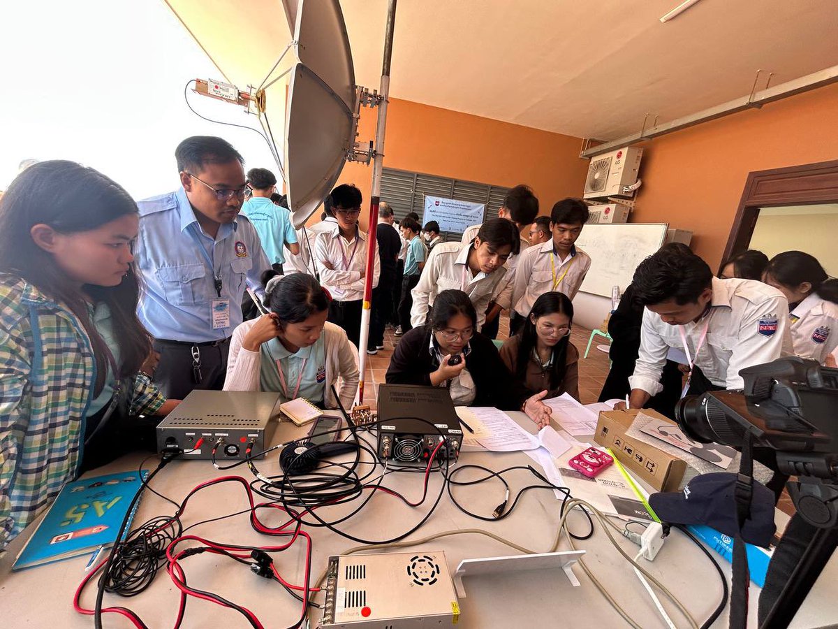 F5VMJ's tweet photo. Many thanks to you all. Quick update:
- QSB seems worse towards the end of the day, so I will try to be QRV earlier in the mornings and see how it goes.
- Temperature is about 35degC in shade. My laptop overheats and freezes. NPIC staff have now kindly made possible an ethernet connection to the club room (with aircon).
- My SDR ground station is still near dish of course and temperature controlled cooling fans are always at max (fingers crossed for no heat issues).
- Most students live on campus 24/7 and are very keen. My attention and time goes 100% to them first.
- Please do not send me emails. All info is on https://t.co/xMJWS7PpDj and is updated by the organisers. We have a full day and replying to all queries takes me too much time at night, sorry.
- Visit Cambodia 🇰🇭 It is a wonderful country with warm, smart and gentle people.
#qo100 #amsat #AmateurRadio