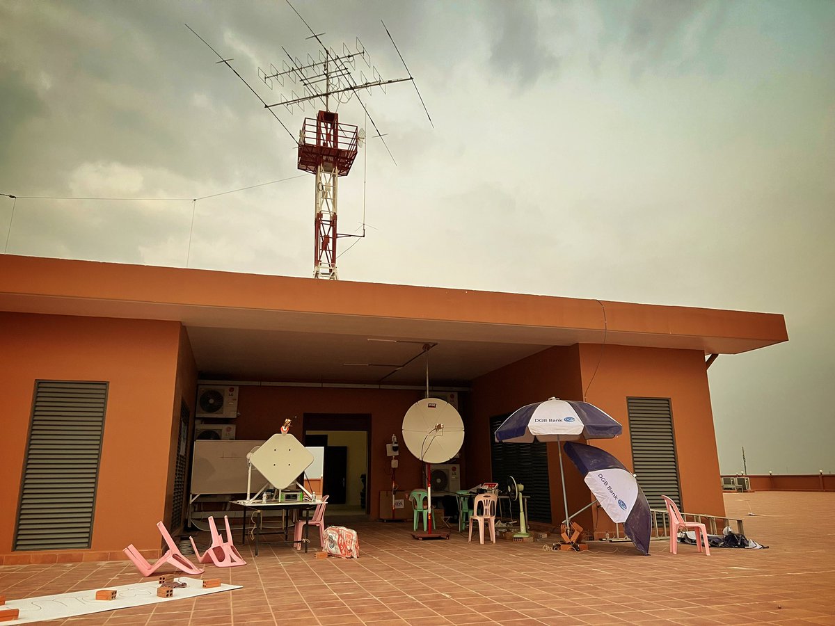 F5VMJ's tweet photo. Many thanks to you all. Quick update:
- QSB seems worse towards the end of the day, so I will try to be QRV earlier in the mornings and see how it goes.
- Temperature is about 35degC in shade. My laptop overheats and freezes. NPIC staff have now kindly made possible an ethernet connection to the club room (with aircon).
- My SDR ground station is still near dish of course and temperature controlled cooling fans are always at max (fingers crossed for no heat issues).
- Most students live on campus 24/7 and are very keen. My attention and time goes 100% to them first.
- Please do not send me emails. All info is on https://t.co/xMJWS7PpDj and is updated by the organisers. We have a full day and replying to all queries takes me too much time at night, sorry.
- Visit Cambodia 🇰🇭 It is a wonderful country with warm, smart and gentle people.
#qo100 #amsat #AmateurRadio