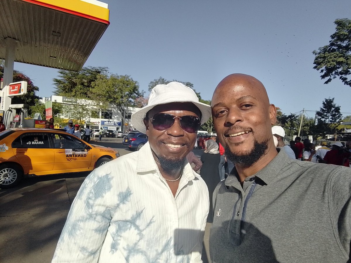 Here we can see a man who quietly established himself as one of the Luhya Nation's higher achieving sons in the area of leadership.

The other guy is a civil servant, I think his name is Ababu Namwamba