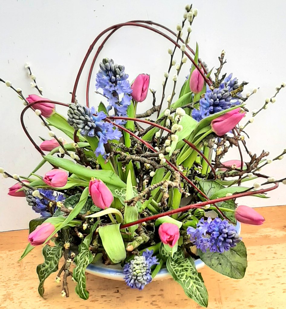 Happy Friday everyone!  Todays Friday flower fix is a riot of Tulips and Hyacinths teamed with pussy willow, cornus, arum and cyclamen foliage. All arranged through a knobly mass of textured pear tree branches.