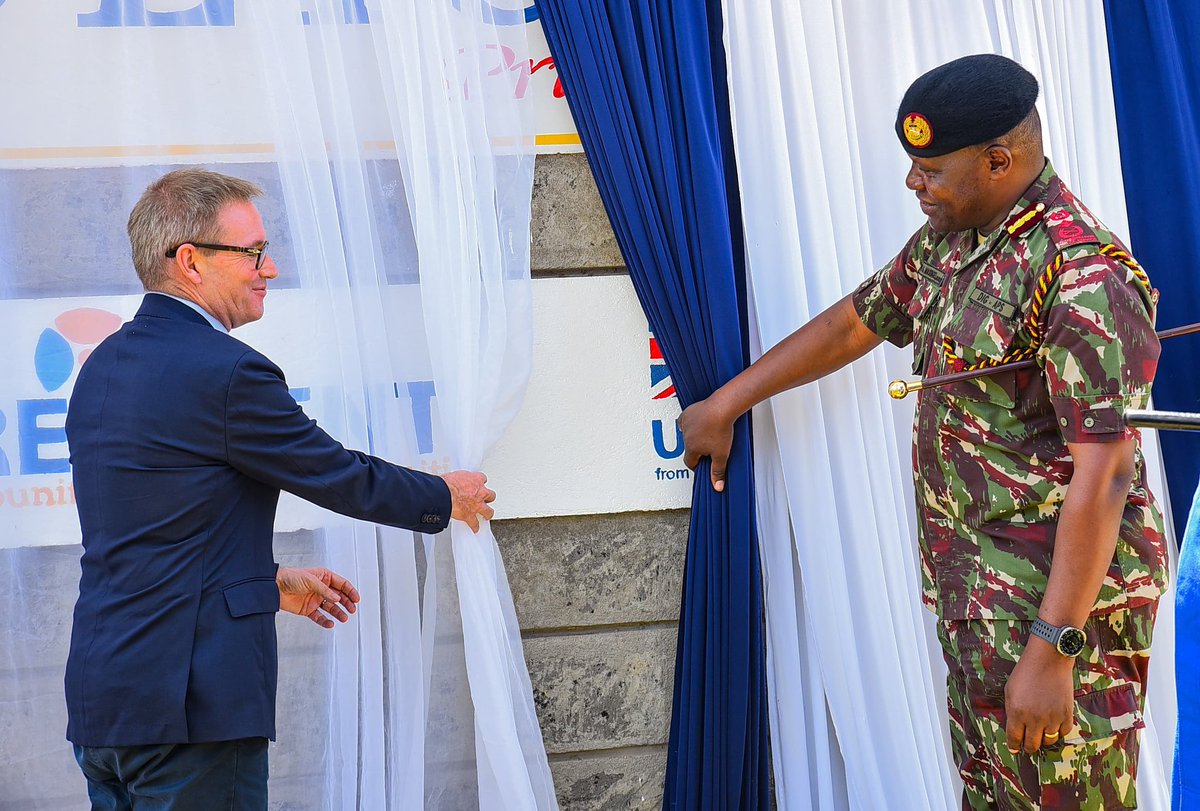 NPSOfficial_KE's tweet photo. DIG-APS ATTENDS OFFICIAL OPENING OF NANYUKI POLICARE CENTRE

Deputy Inspector General of the Administration Police Service, Mr. Gilbert Masengeli, today attended the official opening of the Nanyuki POLICARE Centre at Nanyuki Police Station, Laikipia East Sub-County.

The POLICARE Centre was constructed with support from the British High Commission through the REINVENT Programme and the British Army Training Unit Kenya (BATUK), and handed over to NPS in 2022.  

Since its establishment, the Centre has greatly enhanced the capacity of the National Police Service (NPS) to address Sexual and Gender-Based Violence (SGBV) expeditiously. 

In his address, the British High Commissioner, H.E. Neil Wigan, who was the chief guest, expressed his gratitude to NPS for the dedication and selflessness its officers exhibit in offering services to the public, even under difficult and challenging circumstances.

H.E. Wigan further assured the Service of continued support in the fight against counterterrorism, narcotics, and transnational organised crime.

On his part, DIG Masengeli welcomed the continued partnership with the British Government, noting that the collaboration has enabled the Service to make strides in service delivery for the benefit of the public.

He added that these collective efforts from various stakeholders and partners will also go a long way in strengthening the Inspector General's clarion call to make police stations centres of excellence and to convert Gender Desks into fully-fledged Gender Units.

Today's event also provided an opportunity for the leaders to meet members of the Community Policing Committees, the County Security Committee, Nyumba Kumi leaders, and members of the public in the area, as part of efforts to reinvigorate the fight against GBV.

Also in attendance were the Governor of Laikipia County, Hon. Joshua Irungu, County Police Commander for Laikipia, Mr. Benjamin Cherwon Boen, CP, Laikipia County Commissioner, Mr. Onesmus Kyatha, Chief of Party of REINVENT, Ms. Jaki Mbogo, and representatives from the Ministry of Health, State Department for Gender, and the Judiciary.