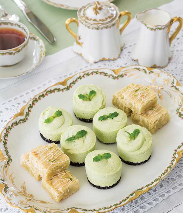 TeaTimeMag's tweet photo. From the verdant centerpieces to the cheery china, a table adorned in green, white, and gold is an idyllic way to celebrate St. Patrick’s Day tomorrow, especially when the tea fare is inspired by Irish cuisine. View the full menu by visiting https://t.co/pGKHXhbaBH. https://t.co/HVbLWz68TQ