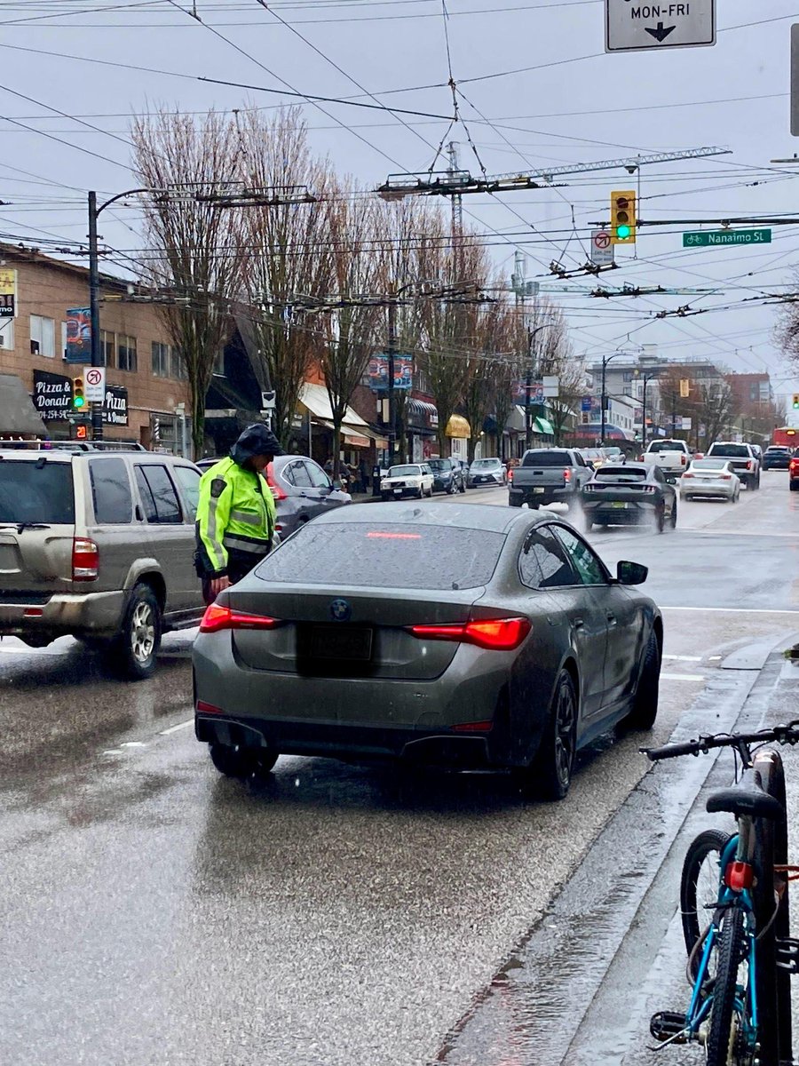 VPDTrafficUnit's tweet photo. Once again folks, March is BC Wide Distracted Driving Campaign. In the rain at Nanaimo and Hastings yesterday. Let's focus on driving and get there safely! #LeaveYourPhoneAlone #WeAreOutThere https://t.co/9JLroQJTYp