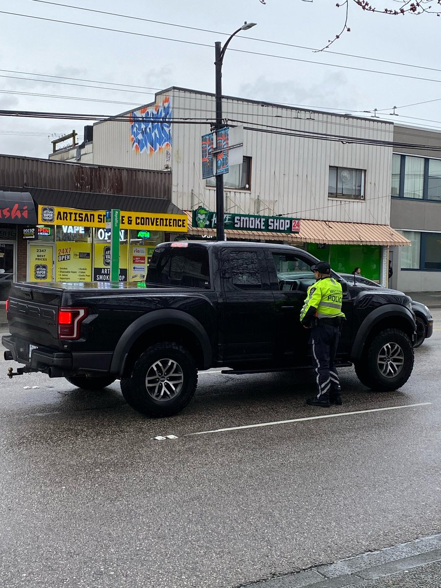 VPDTrafficUnit's tweet photo. Once again folks, March is BC Wide Distracted Driving Campaign. In the rain at Nanaimo and Hastings yesterday. Let's focus on driving and get there safely! #LeaveYourPhoneAlone #WeAreOutThere https://t.co/9JLroQJTYp