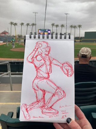 We ❤️ Rosalie, one of our charity’s biggest champions, repping our new T-shirt at <a href="/Athletics/">Athletics</a> Spring Training. Rosalie is a talented artist, fierce advocate, and longtime supporter of our work.