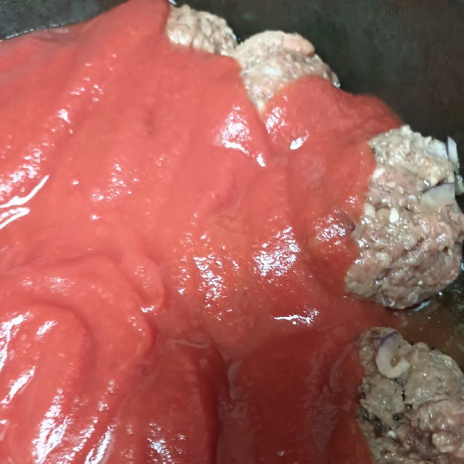 Nothing like tomato sauce and meat balls in a big cast iron.