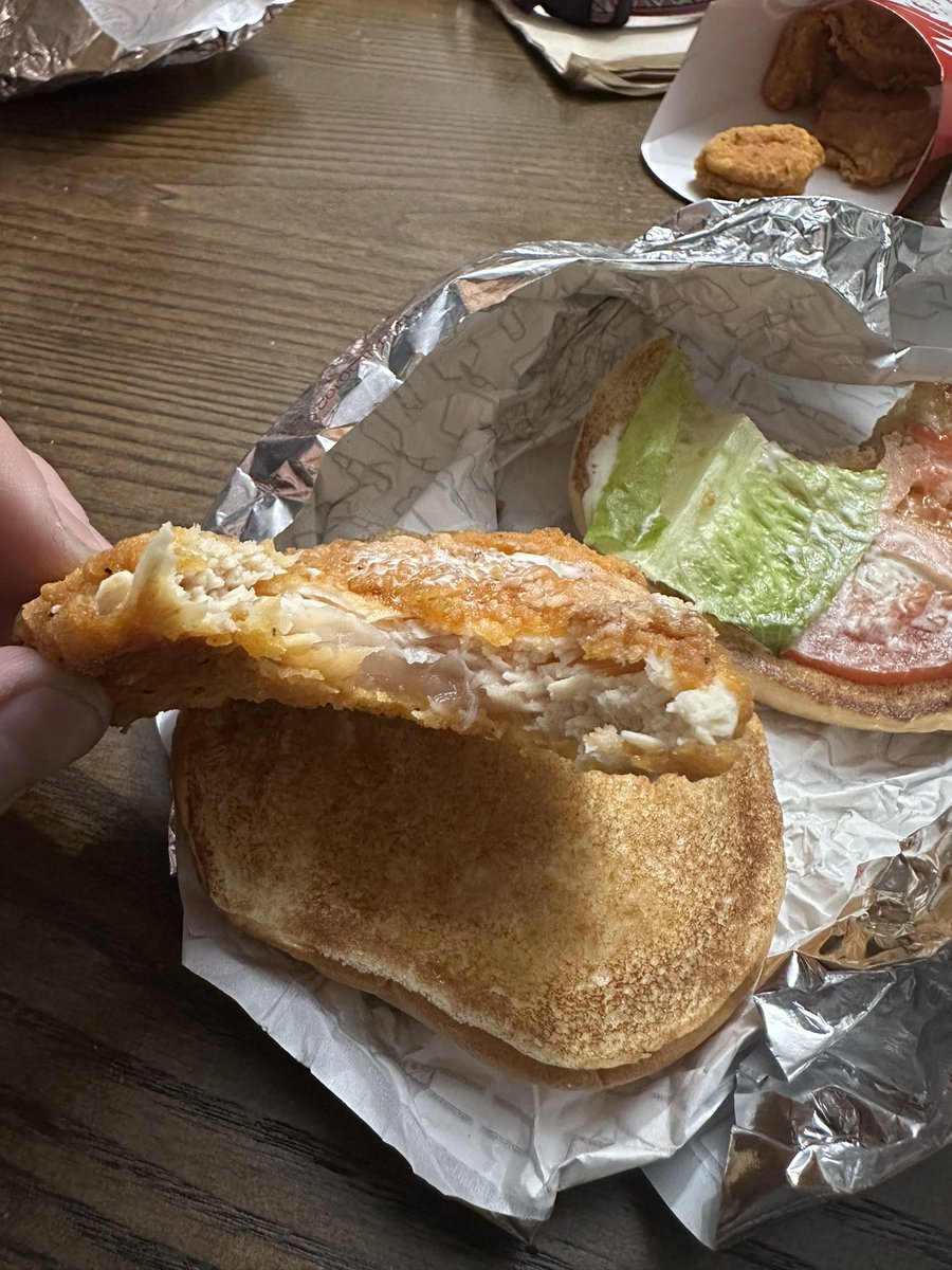 DJuergy's tweet photo. First time I’ve ever had a raw chicken sandwich from @Wendys . Late night nugs fries and no sammich :( https://t.co/0mGAW7CCaf