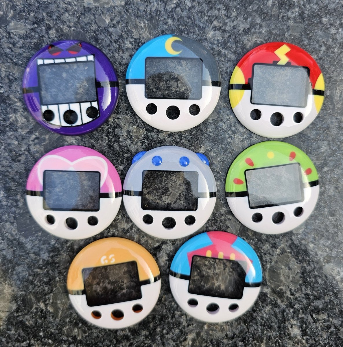 KampCreates's tweet image. New 3D printed Pokewalker shells! This time, they're printed using WJP multicolor resin and they turned out looking much closer to real thing. WJP allows the lens and body of the shell to be one piece and costs much less than multicolor nylon!