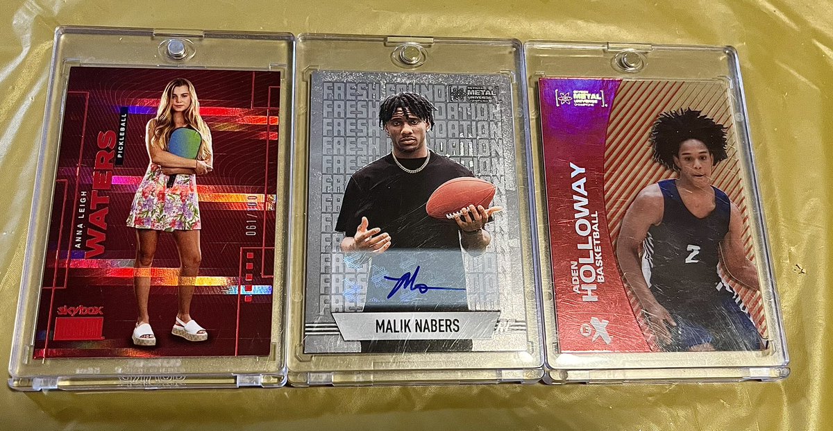 hashields1's tweet photo. Got a box of 2024 Metal Universe as an early bday gift. Fun product. Waters Red Rubies /100, Nabers Auto /75, and Holloway Red EX /31. 
@CardPurchaser https://t.co/QmpRiKiRi4
