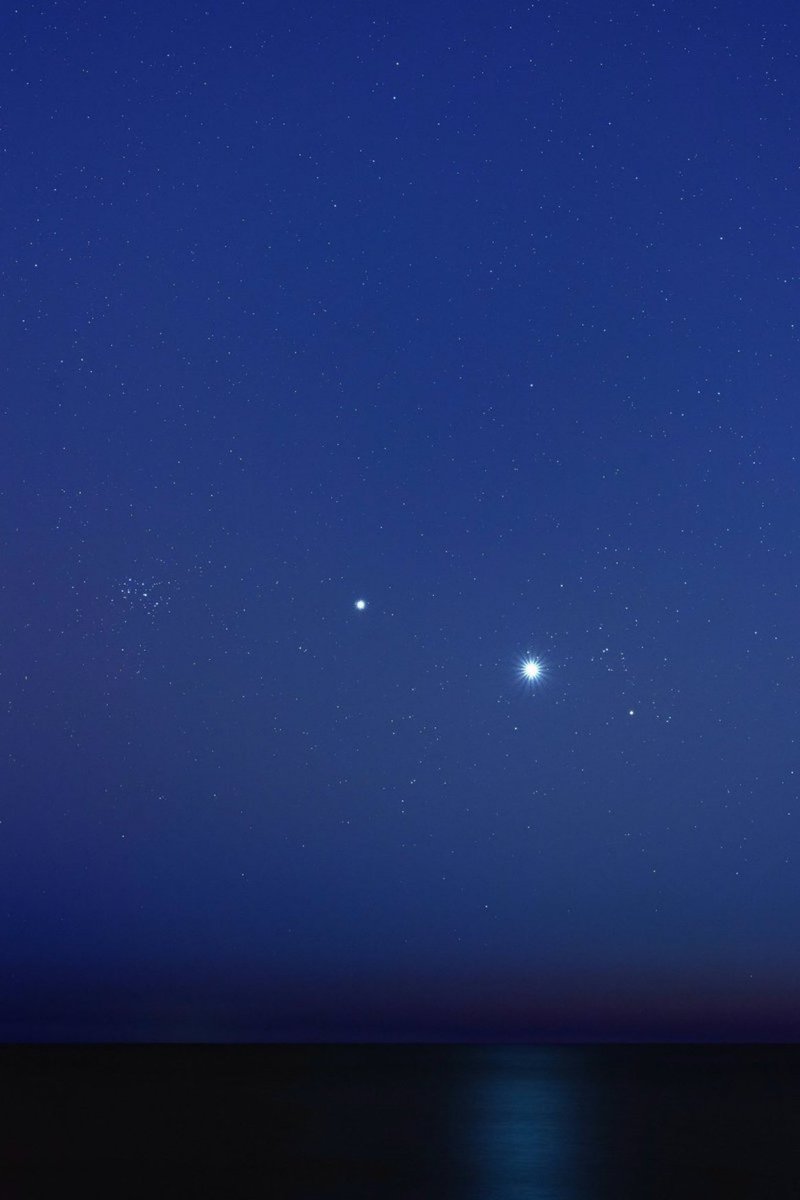 Venus and Jupiter over the ocean