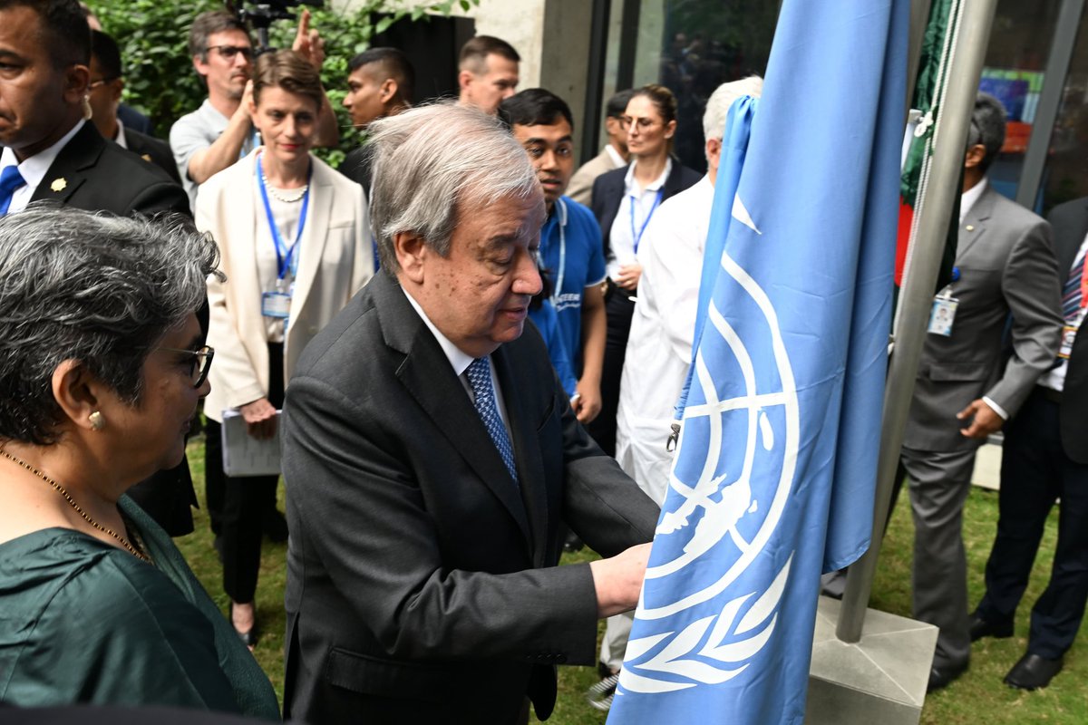 ChiefAdviserGoB's tweet photo. UN Secretary-General Antonio Guterres on Saturday visited the new UN Common Premises to view the 50th anniversary photo exhibition and to do the official UN flag raising. The visit followed a meeting with UNCT Bangladesh. https://t.co/BIhQIRnLVJ