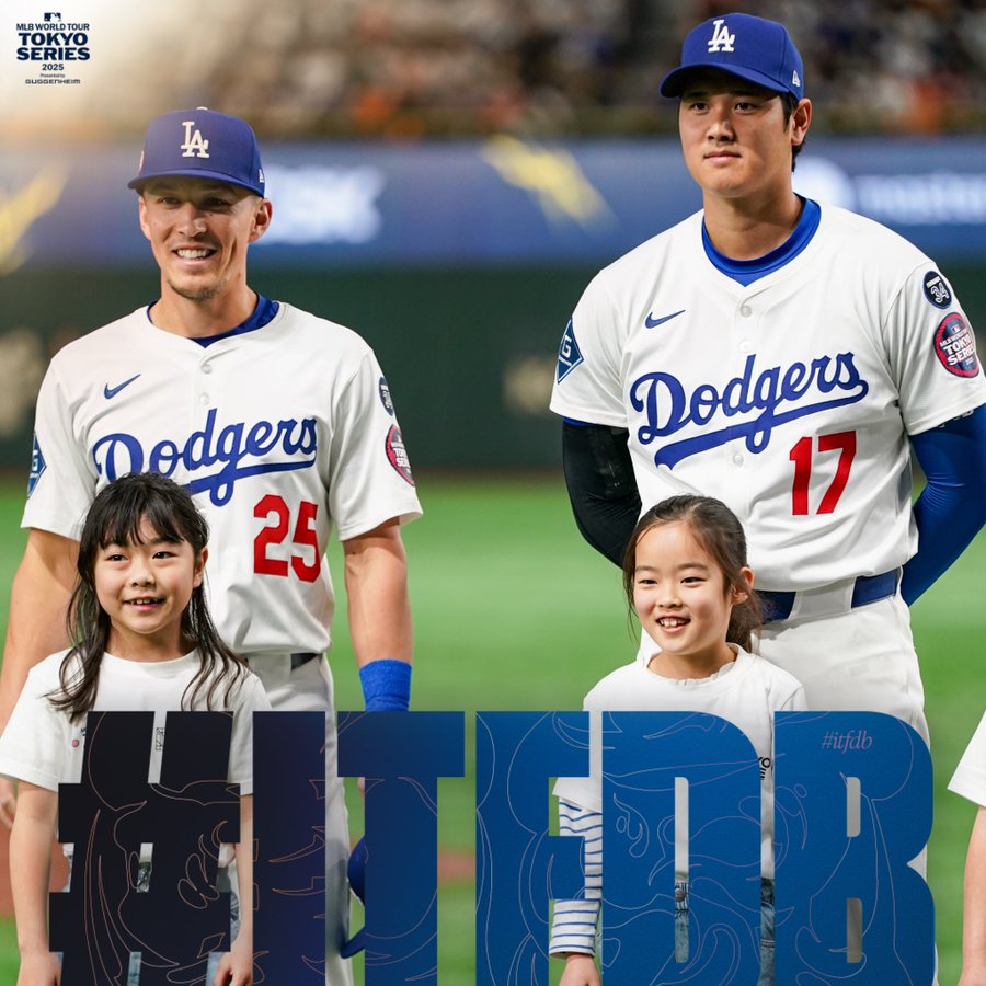 A photo of Tommy Edman and Shohei Ohtani with two kids during pregame.