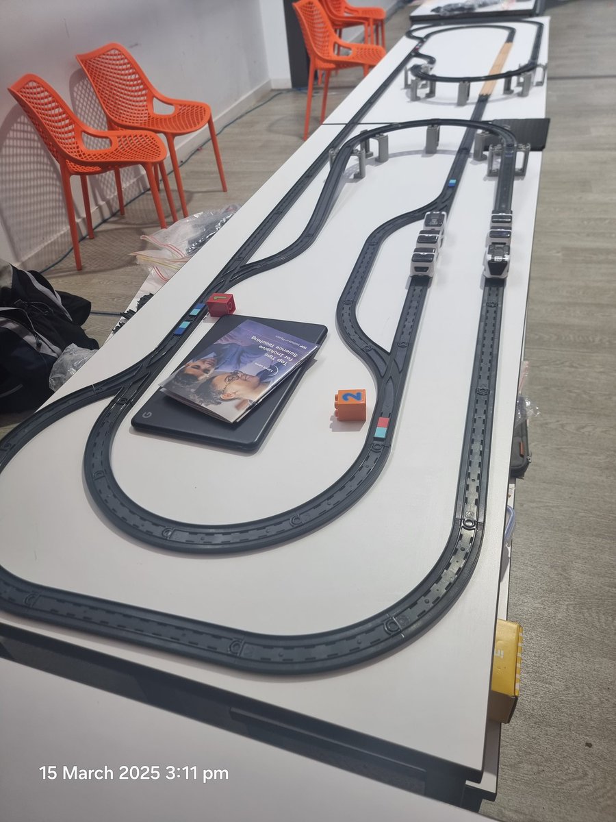 TsuiAllen's tweet photo. With the other exhibitors packed up, I've got more table space to show how much @intelino #SmartTrain track I boughy along with me to the @STEMHUB_SE #KentPhysics25 Festival of Physics. https://t.co/fzpF9i6vjt