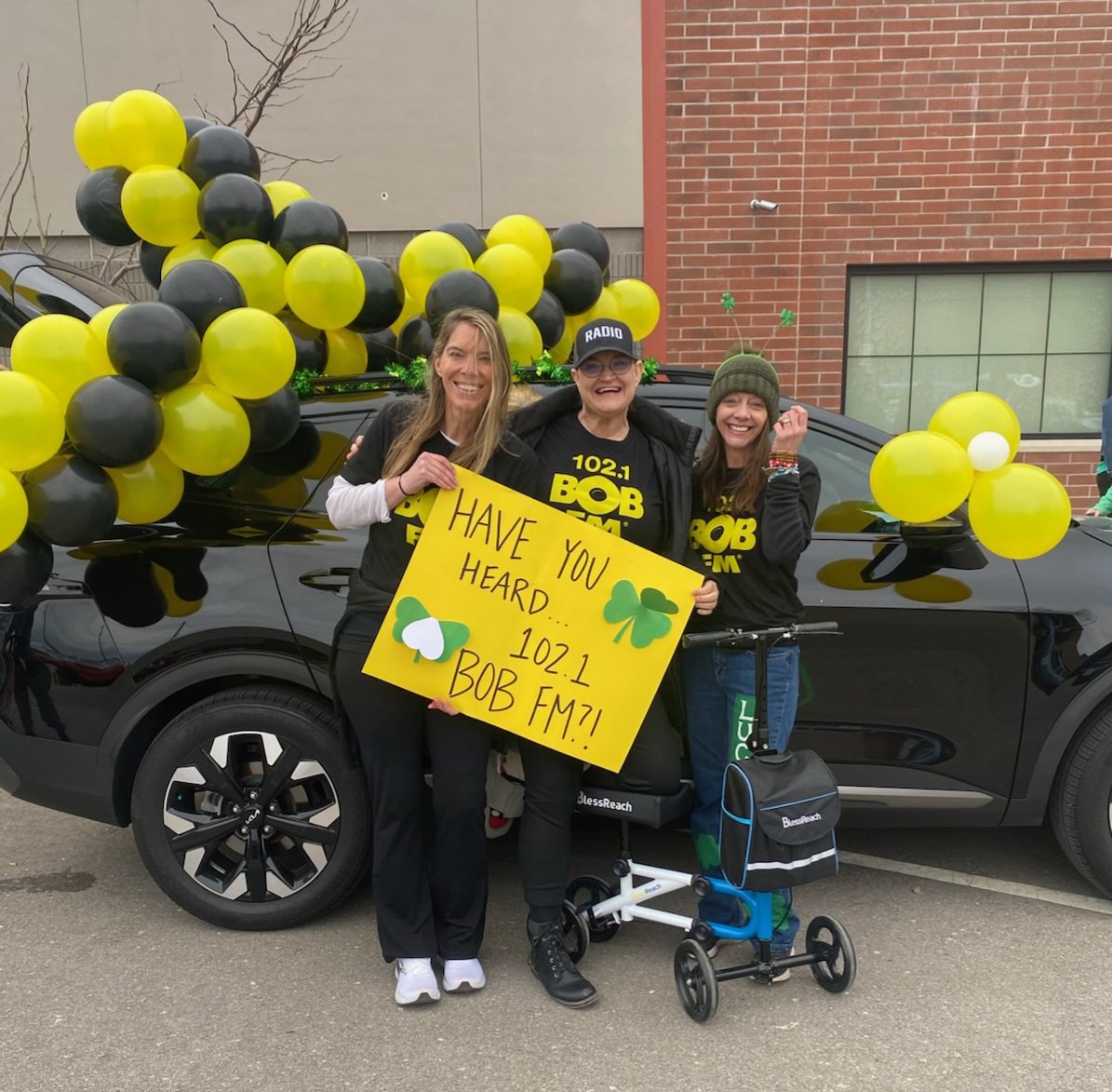 The <a href="/1021BOBFM/">102.1 BOB FM</a> crew is ready for the Snake Saturday parade! 🐍 #kansascity 💛🖤