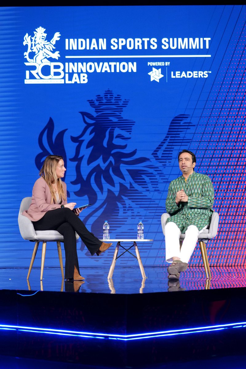 jayantrld's tweet photo. Had a meaningful fireside chat this afternoon at the Indian Sports Summit 2025 organised by the Royal Challengers Bengaluru @RCBTweets , with the Sports and Society Accelerator as Knowledge Partners. Spoke about the work we are doing to promote sports talent and industry through skill development and education. I strongly believe in the role sport can play for transforming our youth and achieving excellence!

Met the champ Virat Kohli briefly before the event!