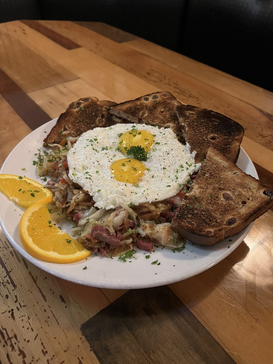 🍀 St. Patrick's Weekend Brunch at the Pub! 🍀

Corned Beef Hash:
Crispy hash browns, tender corned beef, cabbage, roasted peppers, carrots, and Swiss cheese, topped with two eggs cooked your way. Served with your choice of Michigan-made raisin bread or sourdough toast.