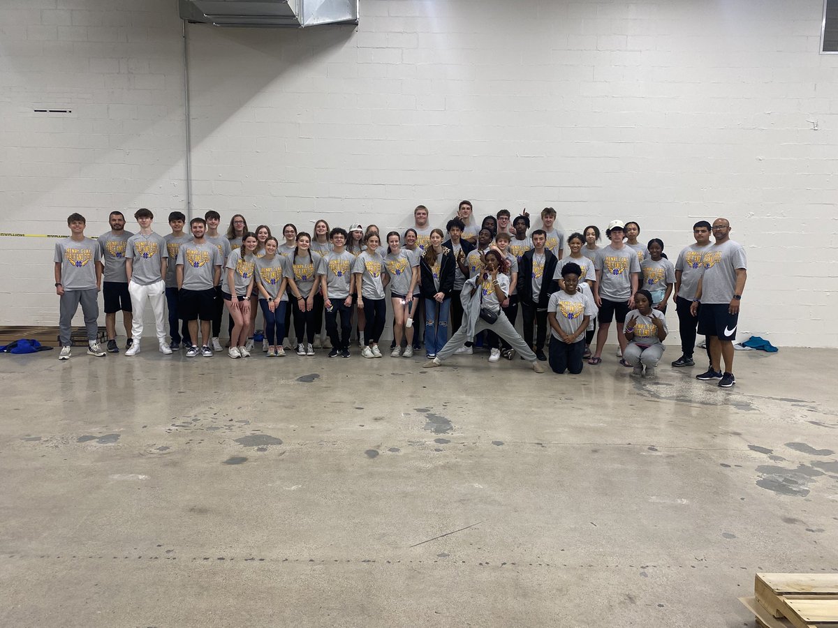 Helping to pack meals for those in need!
