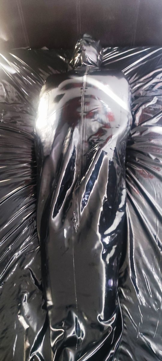 MistressEvelynX's tweet photo. More storage for my new gimp. I got the gimp bound tight in the latex bodybag and had it wear the strap hood over a breather gag. I also kept it’s dick locked up. It was such a nice view as I got some work done. 😈 #gimp #bdsm #latex #bodybag #fetish #domination https://t.co/UF2zQmwXVx