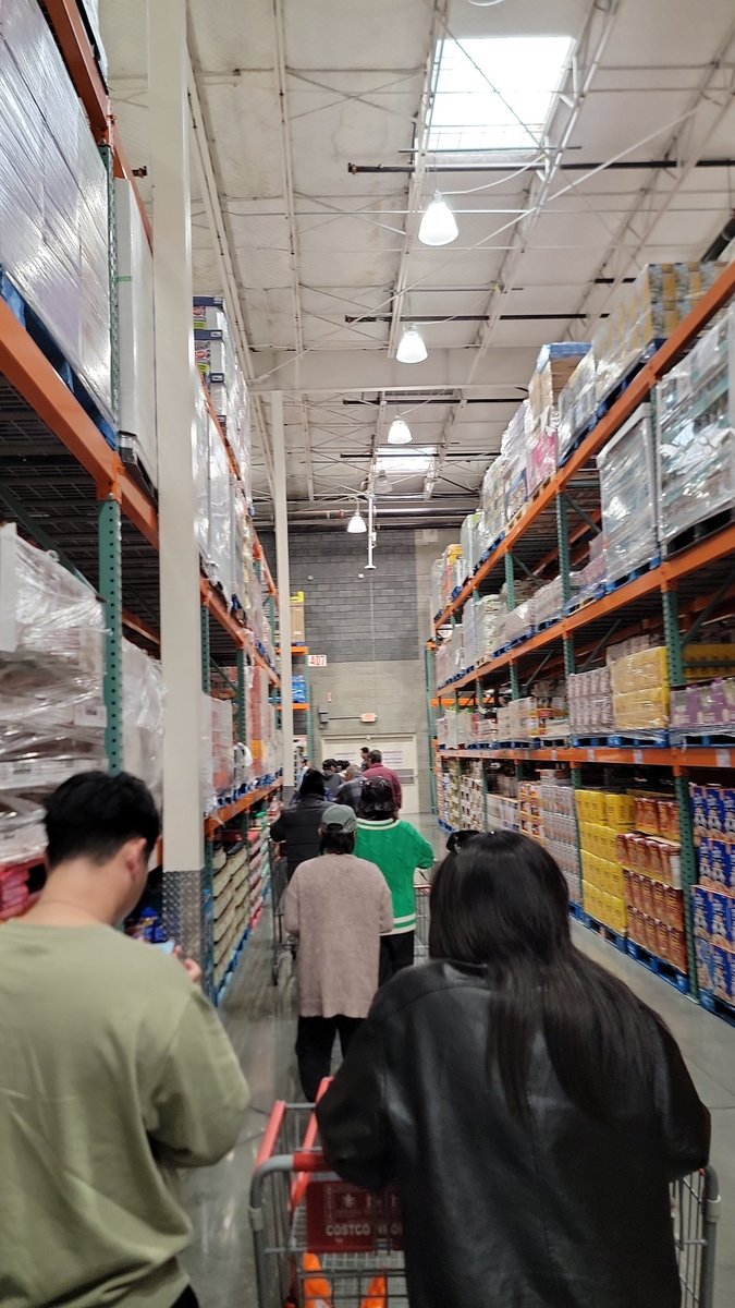 TheRealBesos's tweet photo. Being herded like cattle at Costco for eggs is Donald Trump's America https://t.co/VoLLHhEqkf