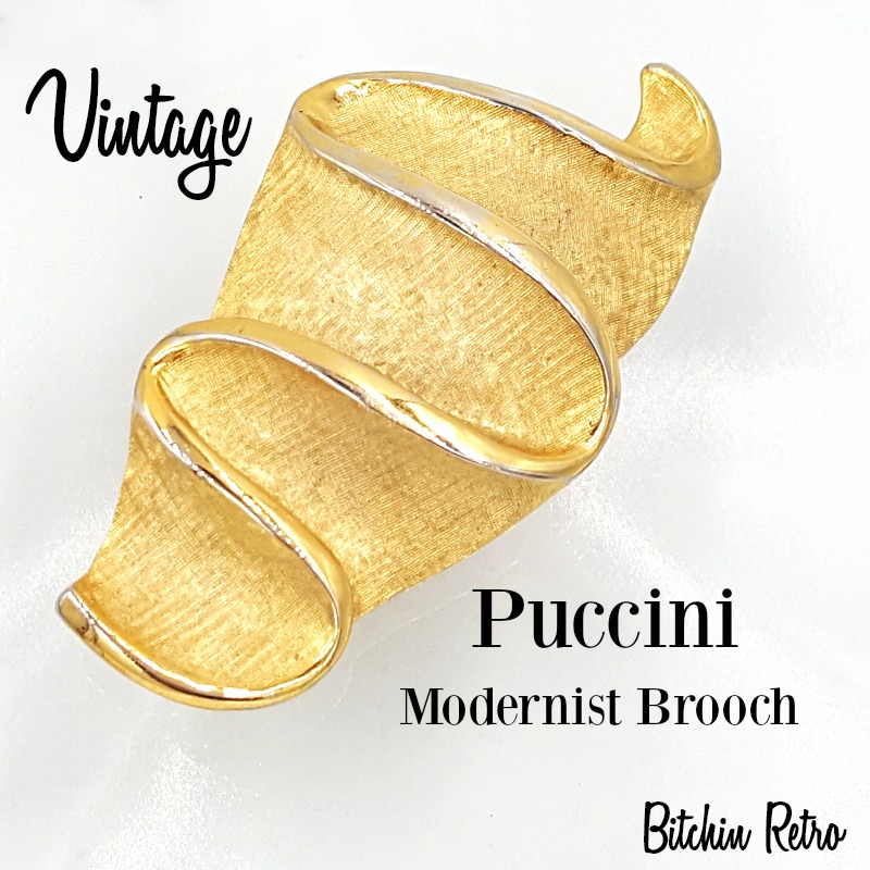 RetroCEO's tweet photo. Vintage Puccini modernist brooch with a mid century seashell design. A high sheen "ribbon" weaves in and out of a textured background which has an almost frosted feel.
#puccini #vintage #vintagejewelry #midcenturymod #seashell #bitchinretro #broochaddict
https://t.co/LTkxV2Gef7 https://t.co/qVXkcXlSpW