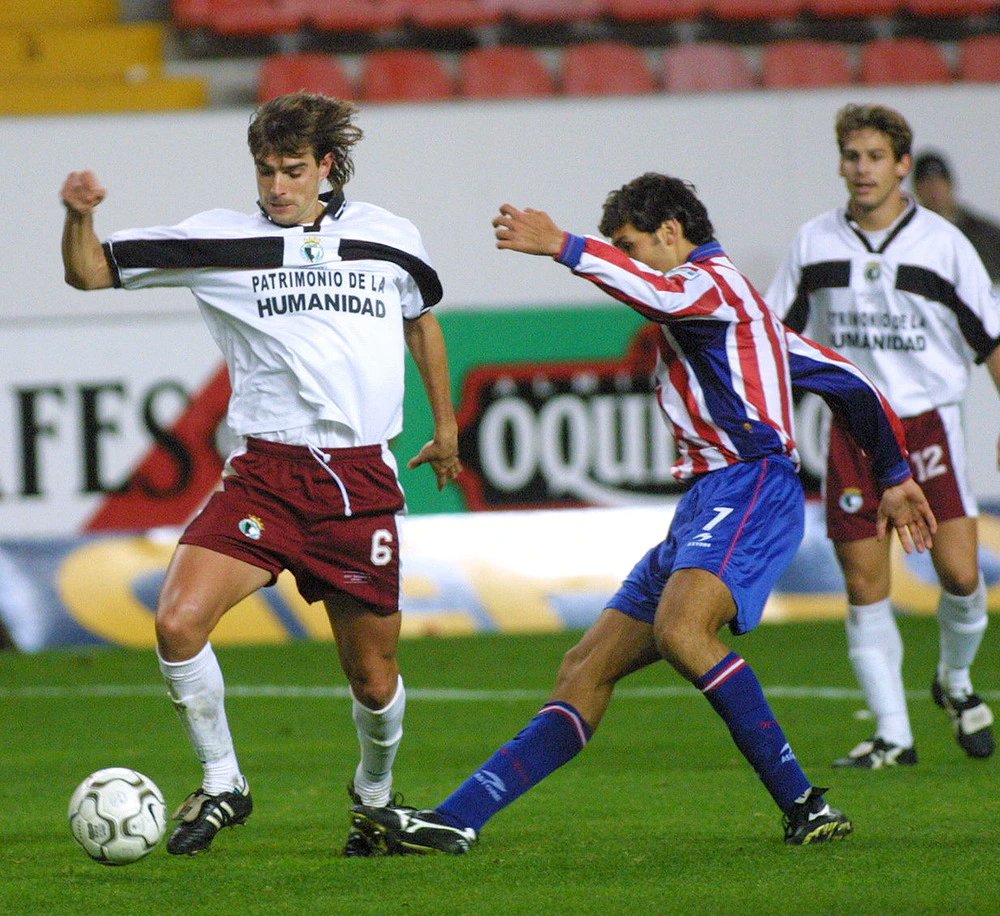 Dani Pendín y Carlos Merino en un Sporting - #BurgosCF de la temporada 2001/02  (0-1 Pepe Gálvez).