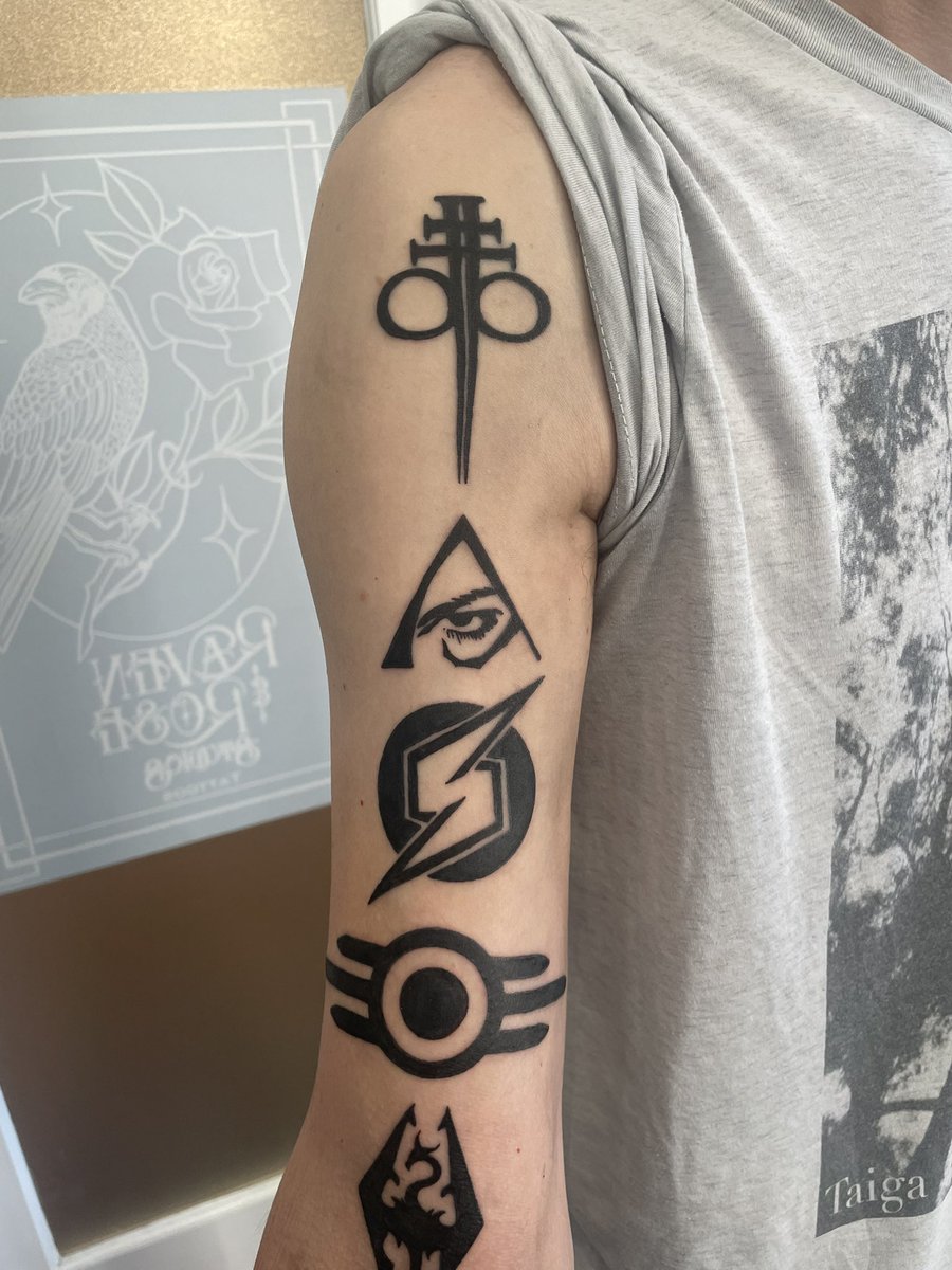 NPurkeypile's tweet photo. I finally did it.

I got every game I’ve shipped as a tattoo.

Bloodrayne 2, Aeon Flux, Metroid Prime 3, Fallout 3, Skyrim, Fallout 4, Fallout 76, Starfield and The Axis Unseen.

🤘 https://t.co/zUe5FamMah