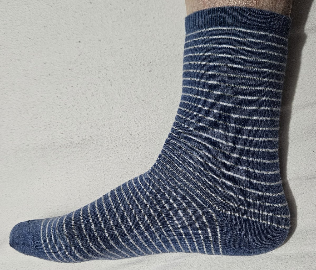 TodaySocks's tweet photo. No day socks left, so it's a pair of evening socks instead #Socks https://t.co/kkw1u4YM2l