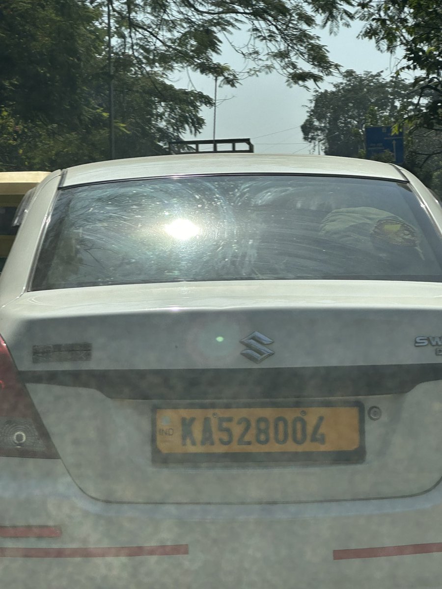 s_harishbjp's tweet photo. @tdkarnataka fake number plate do the needful https://t.co/xMePDKJx9e