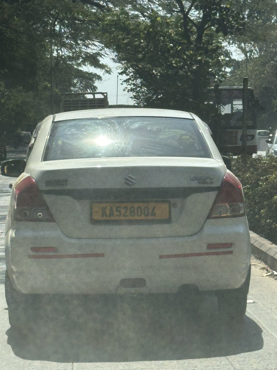 s_harishbjp's tweet photo. @tdkarnataka fake number plate do the needful https://t.co/xMePDKJx9e