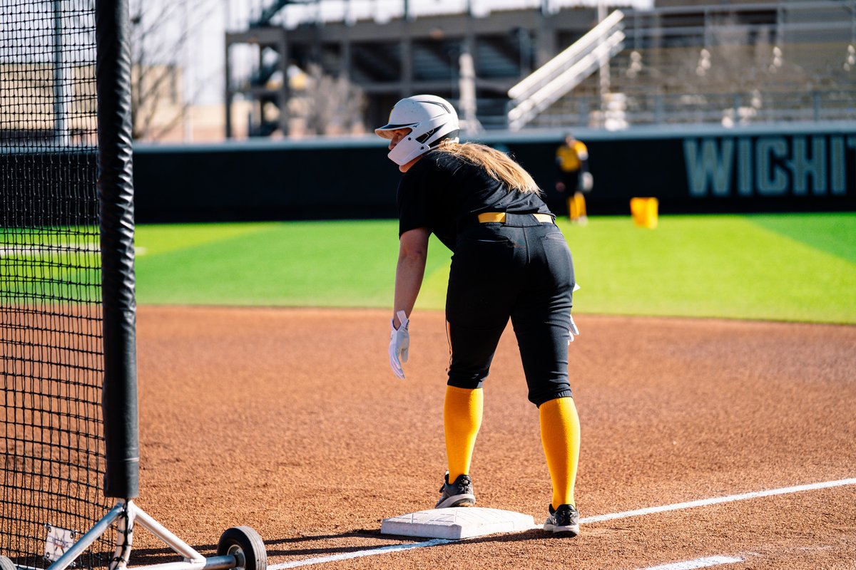 Gettin' the bats warm on a crisp Sunday morning.