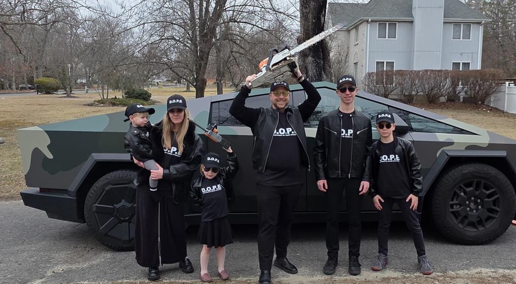 rabimoe's tweet photo. @elonmusk Our #DOPE #Purim #Tesla #Costume. D.O.P.E. Department Of Purim Efficiency https://t.co/TvamrmAWF6