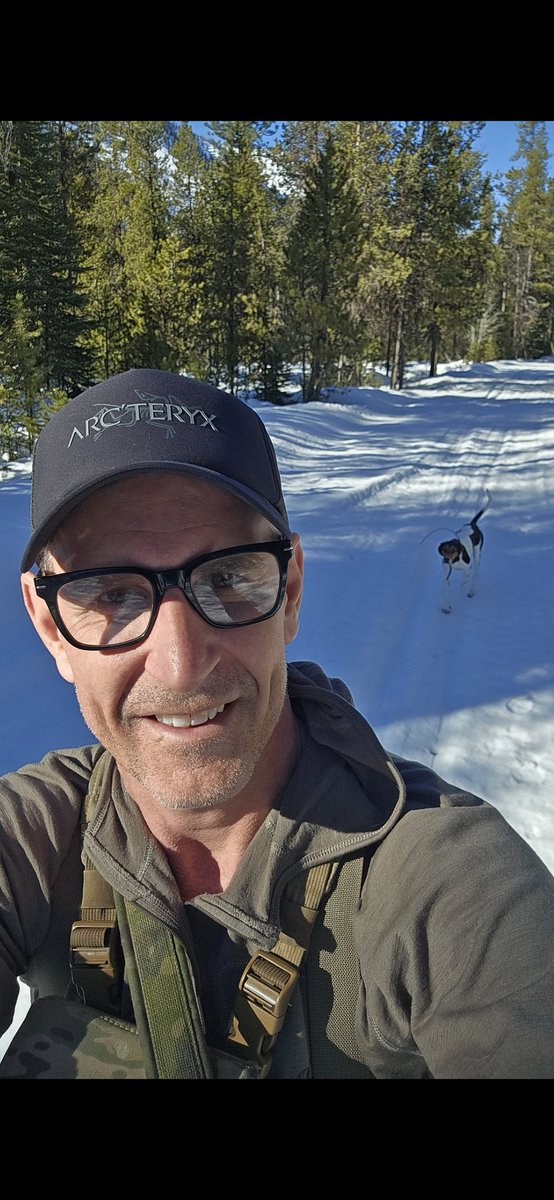 TherealTravisN's tweet photo. Out in the backcountry with my lion huntress, "Delta Dawn". She’s my early detection pro. She loves to tree a sneaky lion! Nothing beats a day in the snow with my best adventure buddy! #Backcountryhunting  #DeltaDawn https://t.co/c16MEPTcze
