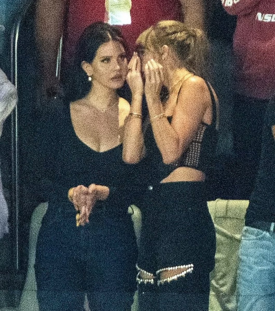 Me telling my friend all about every Sooner softballer when they step in the box