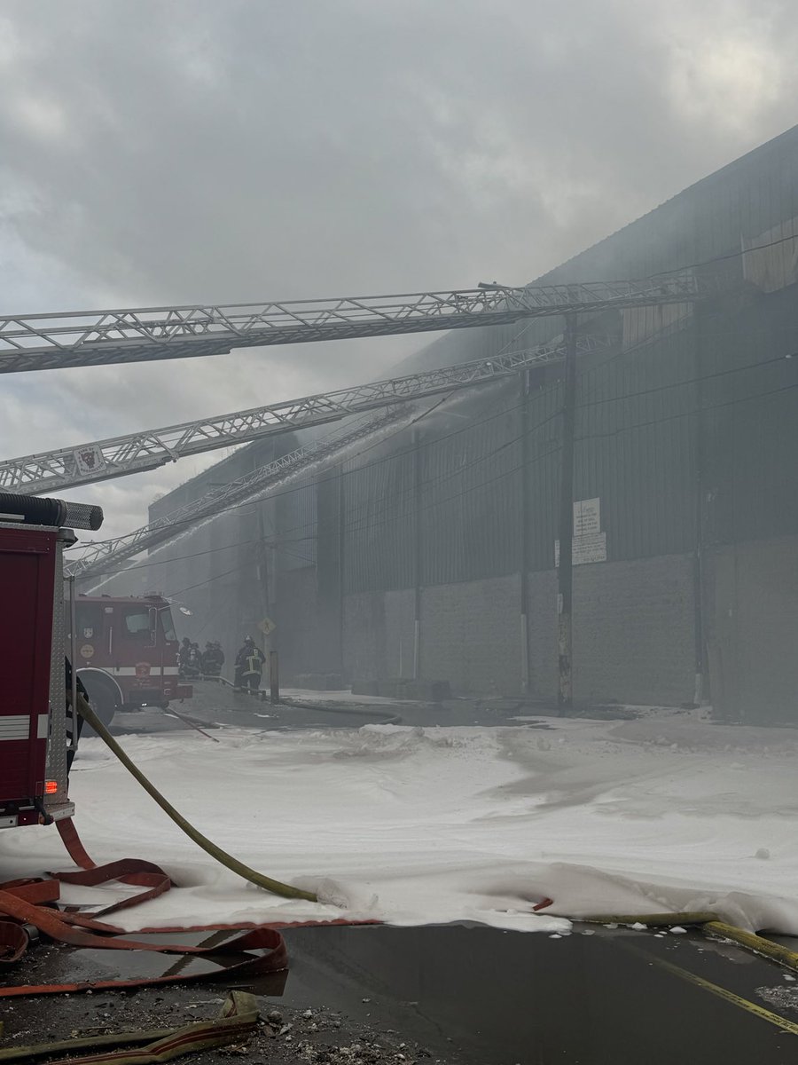 BostonFire's tweet photo. 6 hours into the 8 alarm fire on Gerard st. , as companies have gone through multiple air tanks and are using foam to help extinguish the fire. https://t.co/EbR17kSGI6