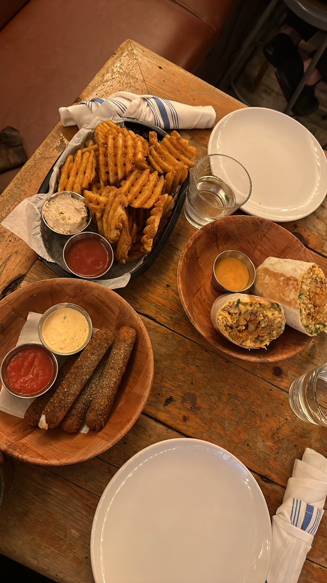 we found a new brunch spot that we’re gatekeeping . Mozzarella sticks with kimchi ranch and waffle fries with spicy ketchup and onion dip and chorizo breakfast burrito best food ever ong omg Omg omg